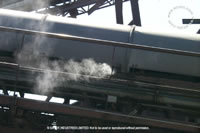 nozzle on covered waste conveyor 3
