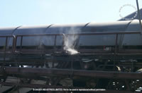 nozzle on covered waste conveyor 4